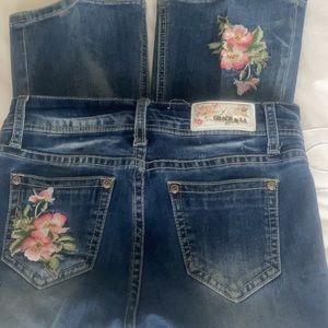 Grace, medium wash bootcut denim jeans. 12